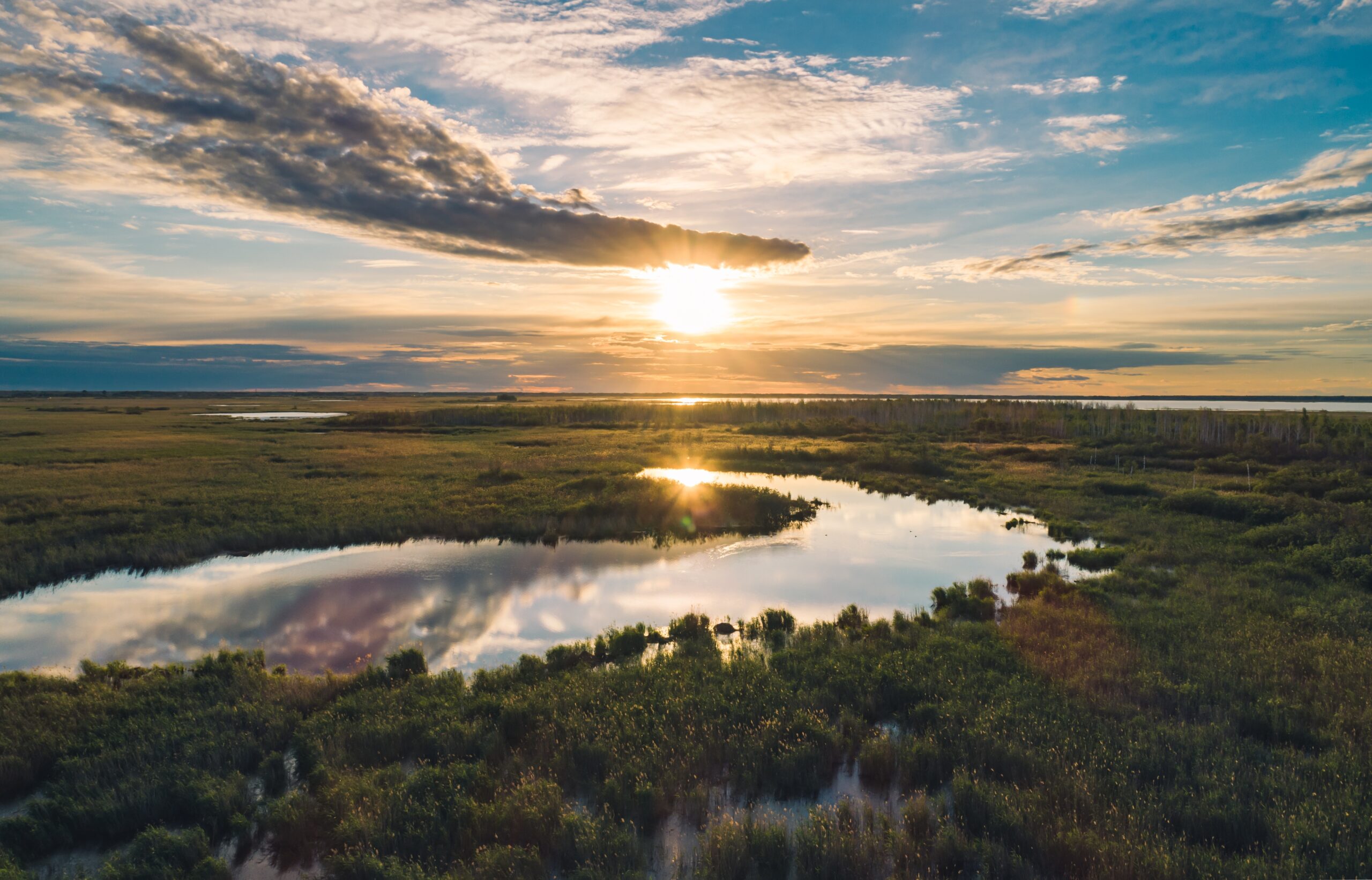 Scenic,Aerial,View,Of,Wetland,And,River,At,Sunset